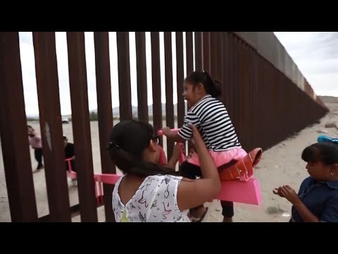 Neon Pink Seesaw Unites Kids at U.S.-Mexico Border