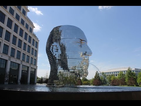 Metalmorphosis - Giant Metal Head Kinetic Sculpture in Charlotte