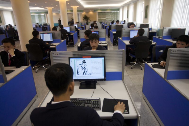 David Guttenfelder - In this April 13, 2011 photo, people work on library computers at Kim Il Sung University in Pyongyang, North Korea. North Korea is undergoing a digital revolution of sorts, even as it holds some of the strictest cyberspace policies in the world