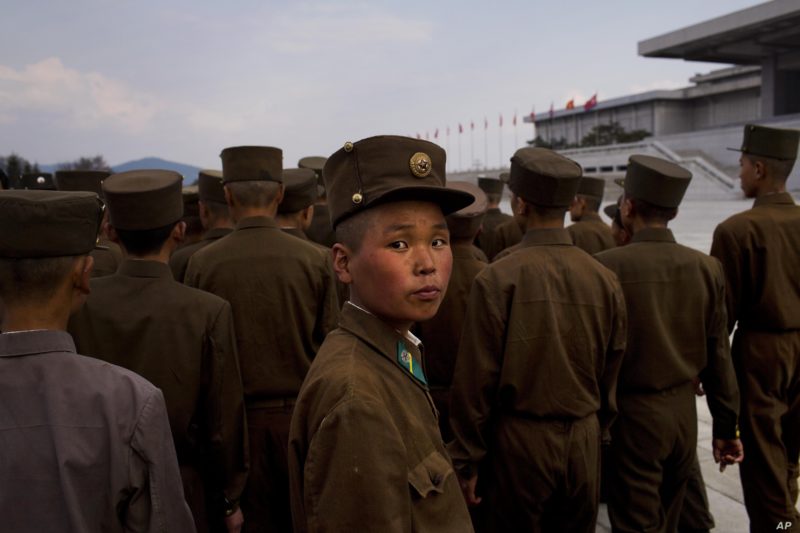 David Guttenfelder - North Korean soldiers tour the park surrounding Kumsusan Palace of the Sun, the mausoleum where the bodies of the late leaders Kim Il Sung and Kim Jong Il lie embalmed, in Pyongyang, April 25, 2013