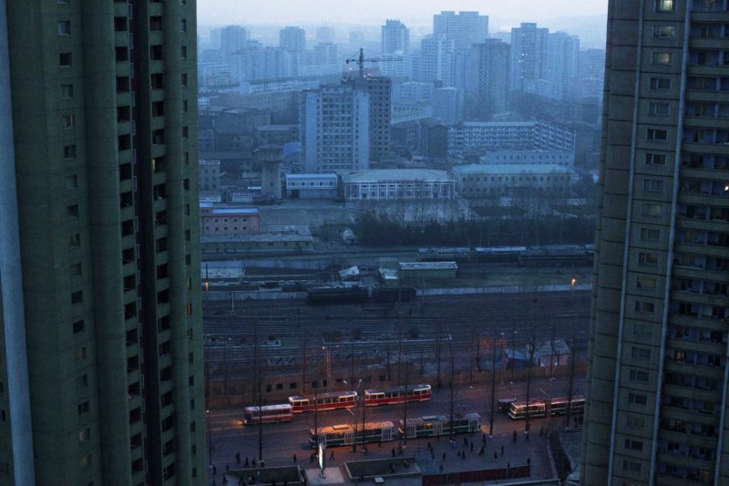 David Guttenfelder - This April 12, 2011 photo shows central Pyongyang, North Korea at dusk through a hotel room window