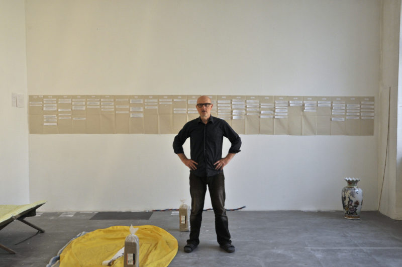 hans hemmert working on a balloon sculpture in his berlin studio