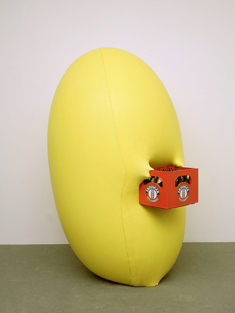 Hans Hemmert – o.T. (Yellow sculpture fitting to beer crate), 1998, balloon, air, artist, beer crate