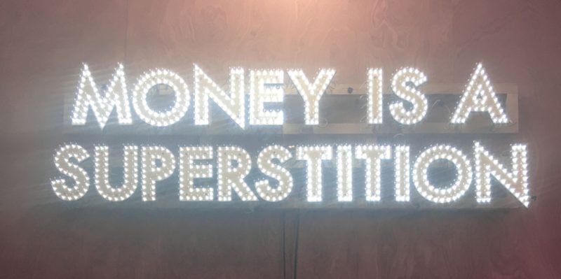 Robert Montgomery - Money is a Superstition, 2018, Plywood, LED Light, Polymer, 52 x 160 x 10 cm (20.47 x 63 x 3.94 in.)