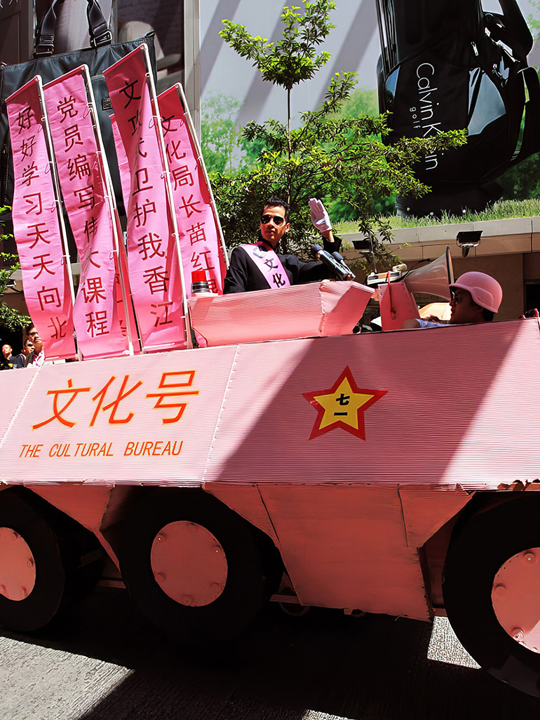 Kacey Wong & his provocative pink tank at Hong Kong's 1 July marches