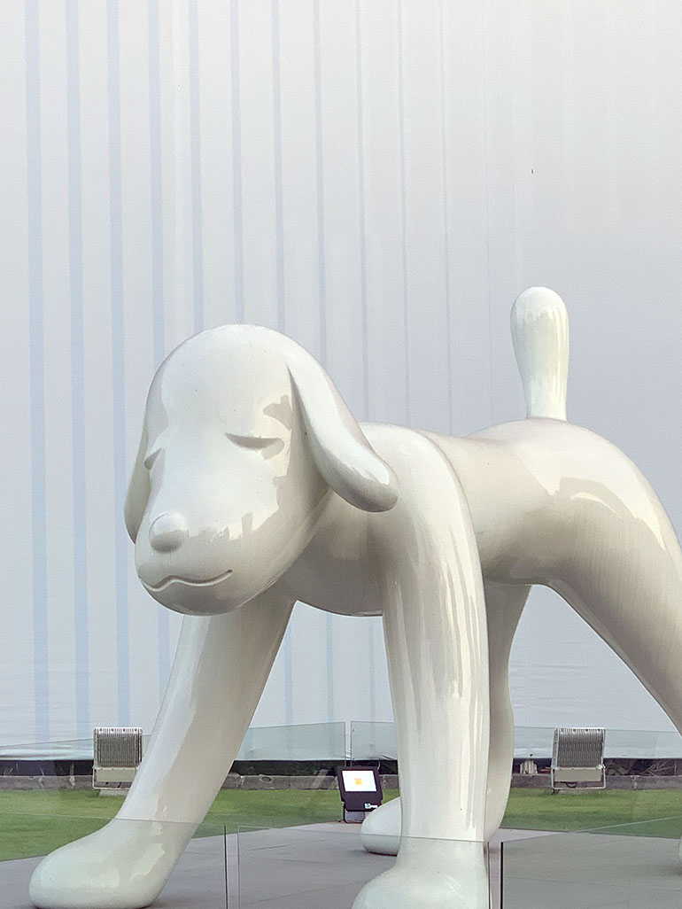 Yoshitomo-Nara-Your-Dog-2017-painted-aluminum-304.8-x-223.5-x-452.1-cm-Bangkok-Art-Biennale-2019-