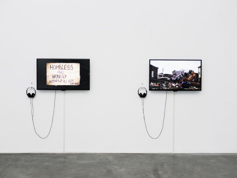 Left screen: Andres Serrano - <em>Signs of the Times</em>, 2013 Right screen: Chim Pom - <em>Ki-Ai 100, 100 Cheers</em>, 2011 Installation view, Total Museum of Contemporary Art, Seoul, South Korea, 2014