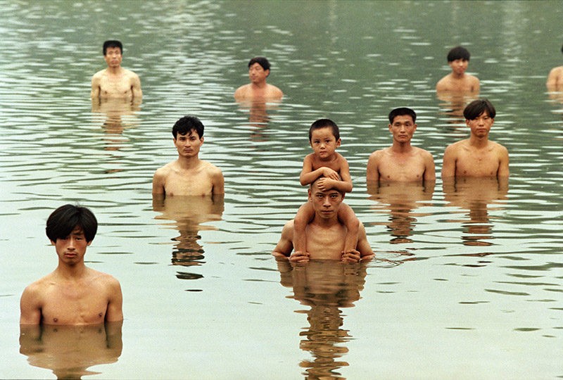 Zhang Huan - To Raise the Water Level in a Fishpond, 1997, 6 min 9 sec, Beijing, China