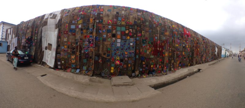 Ibrahim Mahama - Social Reality, 2014, James Town, Accra, Ghana, fabric made from coal sacks and wax print panels