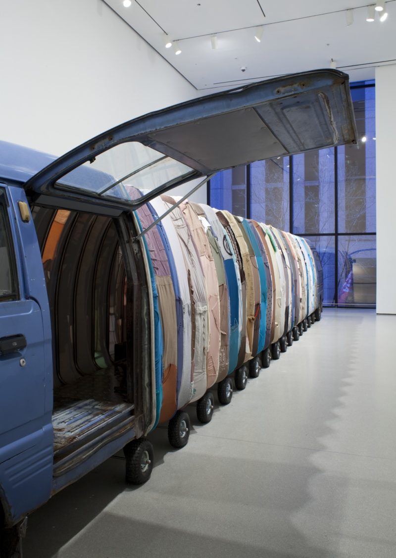 Yin Xiuzhen – Collective Subconscious, 2007, Minibus, stainless steel, used clothes, stools, music, 1420 x 140 x 190 cm, Museum of Modern Art, New York