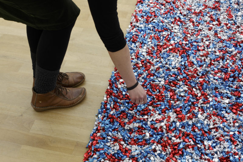 Félix González-Torres – Untitled (USA Today), 1990, Candies, individually wrapped in red, silver, and blue cellophane (endless supply), Dimensions vary with installation Ideal weight 300 lbs (136 kg)