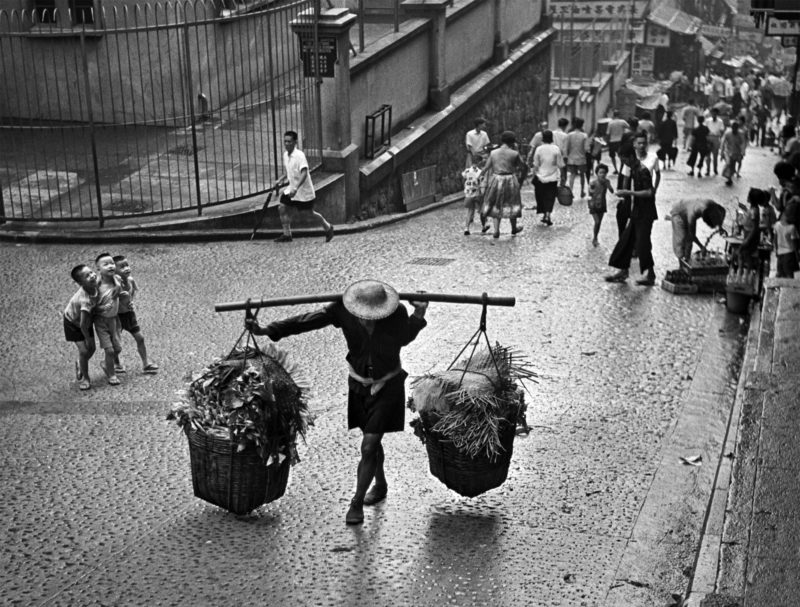 Fan Ho - Between Showers, 1962