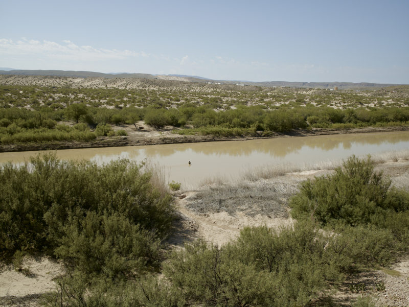 Richard Misrach - Man wading across the Rio Grande. Big Bend National Park, Texas, 2013