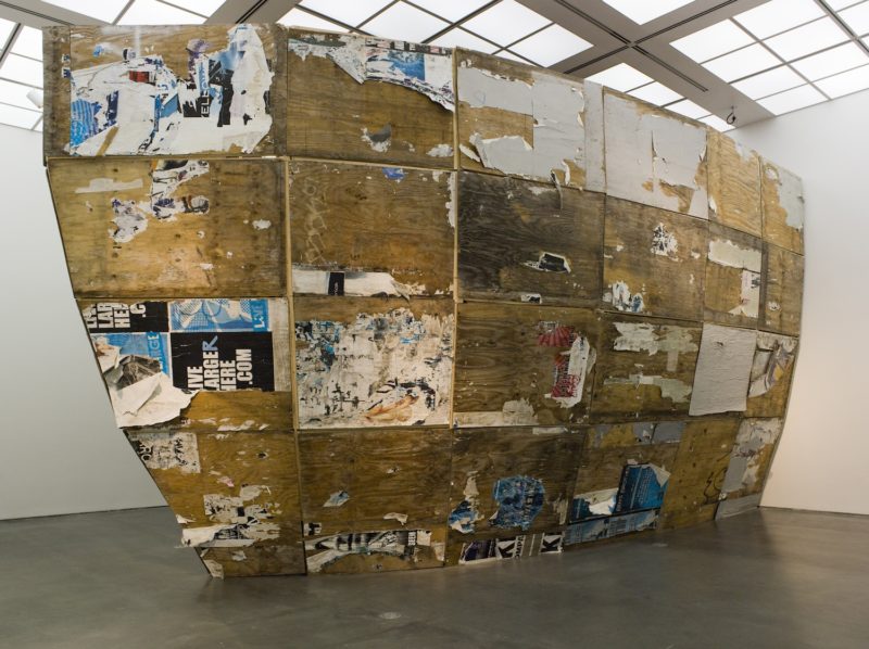 Mark Bradford - Detail, 2009–10 (parts of Mithra reassembled), plywood, found paper, adhesive, 498 x 549 x 914 cm) Installation view at the Wexner Center for the Arts