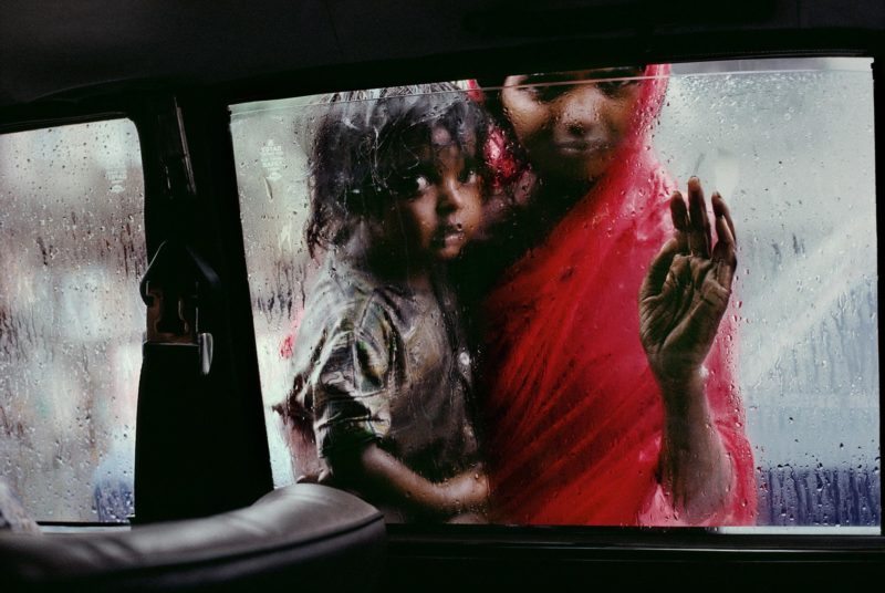 Steve McCurry - Mother and Child at Car Window, Bombay:Mumbai, India, 1993