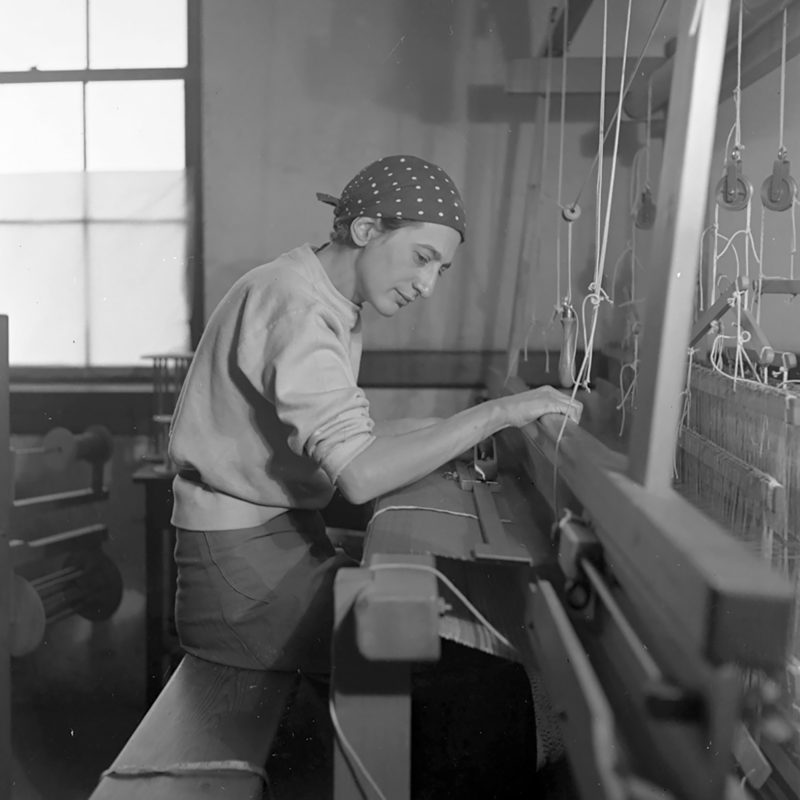 Anni Albers works in her weaving studio at Black Mountain College in 1937