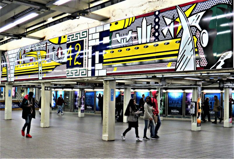 Roy Lichtenstein – Times Square Mural, 1990 (fabricated 1994; installed 2002), Porcelain enamel on steel, 16 panels, 1.85 x 16.26 m (overall), 73 x 640 1/2 inches, NYC Times Square, 42nd Street Station, New York City