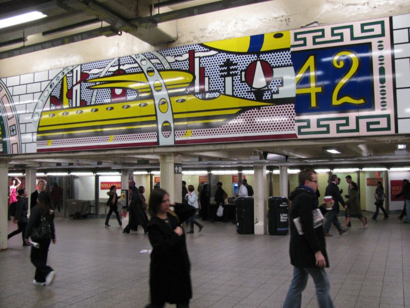 Roy Lichtenstein – Times Square Mural, 1990 (fabricated 1994; installed 2002), Porcelain enamel on steel, 16 panels, 1.85 x 16.26 m (overall), 73 x 640 1/2 inches, NYCT Times Square, 42nd Street Station, New York City  