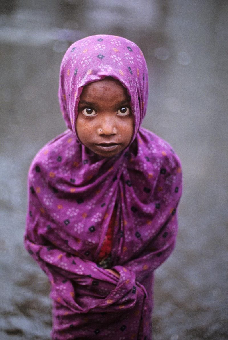 Steve McCurry - Girl in Monsoon, Bombay, India, 1995