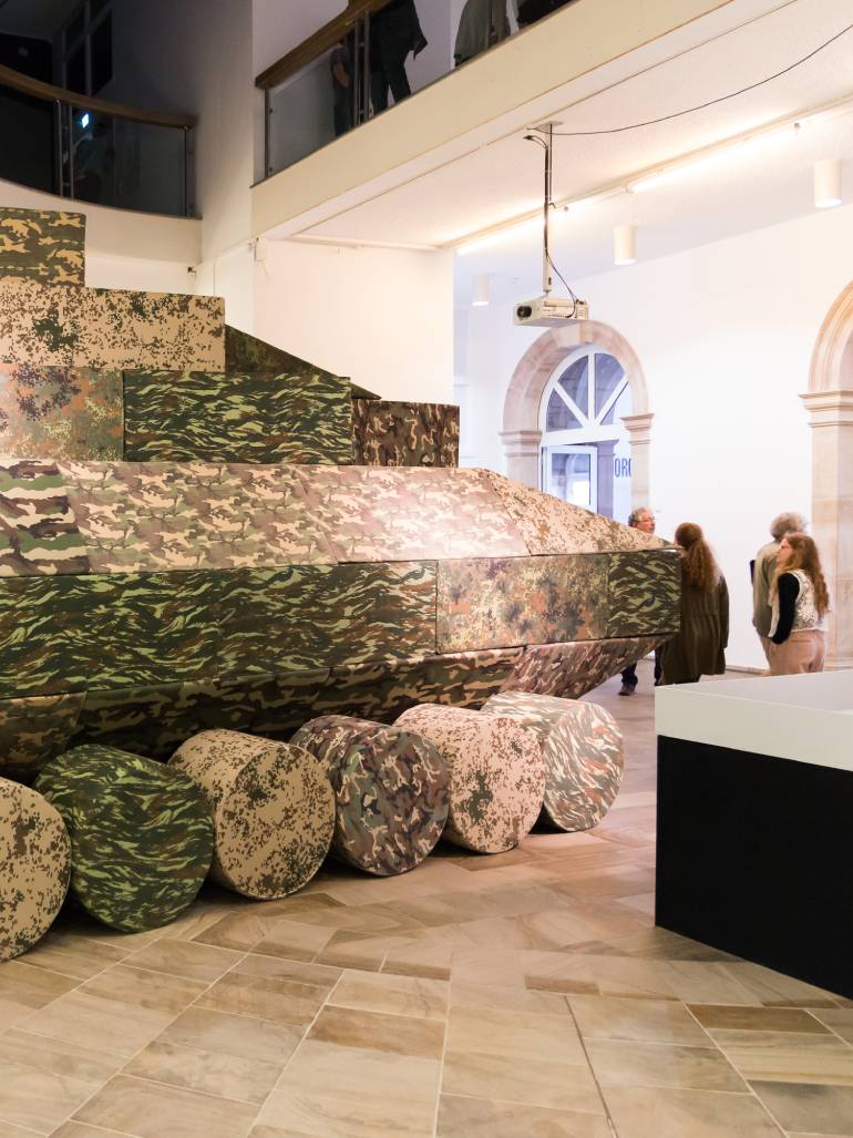Andreas Angelidakis - Polemos, 2017, 136 foam and vinyl seating modules, camouflage fabrics, installation view, documenta 14, Fridericianum museum, Kassel, Germany, 2017 feat