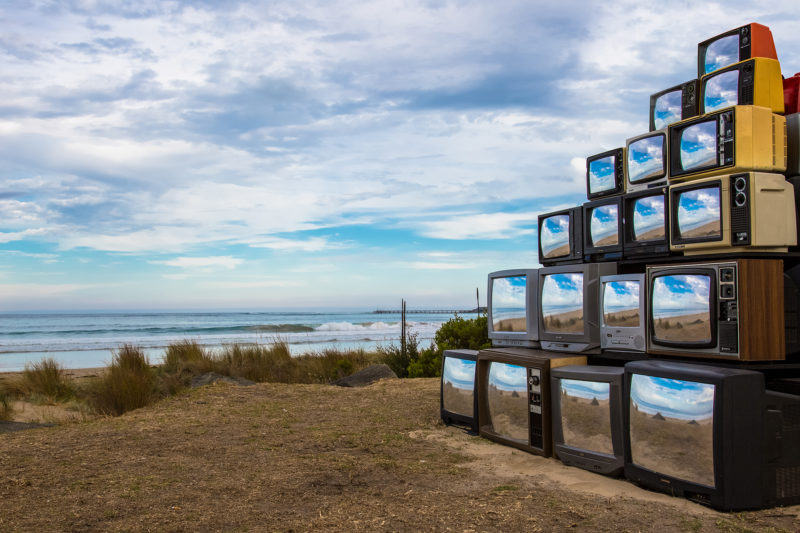 Shirin Abedinirad – Revision, 2018, mirrored retro television sets, installation view, Landfall Lorne Sculpture Biennale, Lorne, Australia