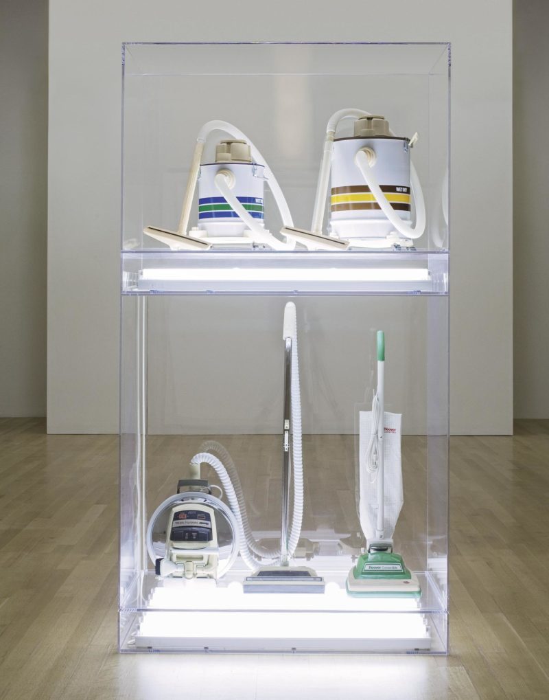 Jeff Koons - The New - New Hoover Celebrity Iv, New Hoover Convertible, New Shelton 5 Gallon Wet/Dry, New Shelton 10 Gallon Wet/Dry Doubledecker, 1986, Four vacuum cleaners, acrylic, fluorescent lights, 251.5 x 135.9 x 71.1 cm