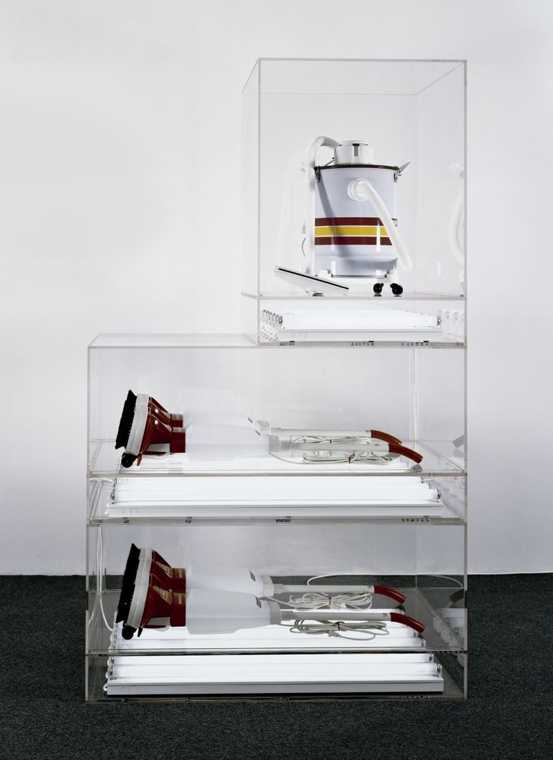 Jeff Koons - The New - New Hoover Deluxe Shampoo Polishers, New Shelton Wet/Dry 10-gallon Displaced Tripledecker, 1981-87, Shampoo polishers, vacuum cleaner, Plexiglas, and fluorescent tubes, 231.1 × 137.2 × 71.1 cm