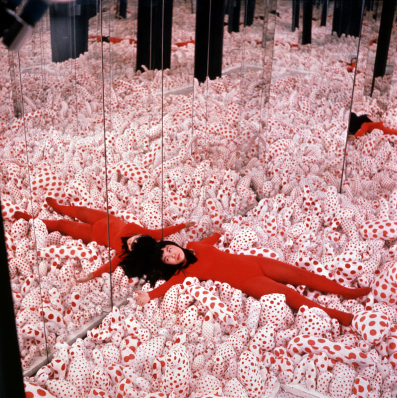 Installation view of Yayoi Kusama’s first – Infinity Mirror Room—Phalli’s Field, 1965, Sewn stuffed cotton fabric, board, and mirrors, in Floor Show, Castellane Gallery, New York, 1965