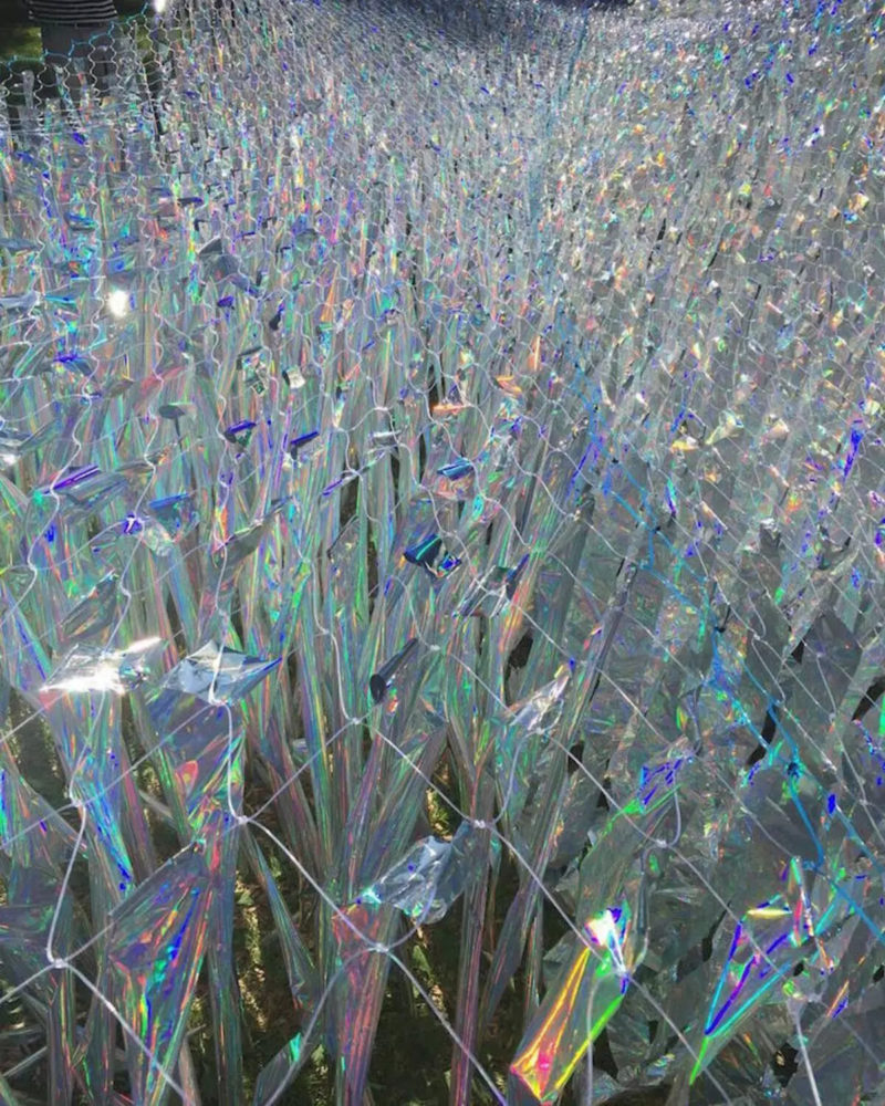 Preparation of Poetic Kinetics' Liquid Shard, 2016, holographic Mylar, monofilaments, approx. 15,000 square feet