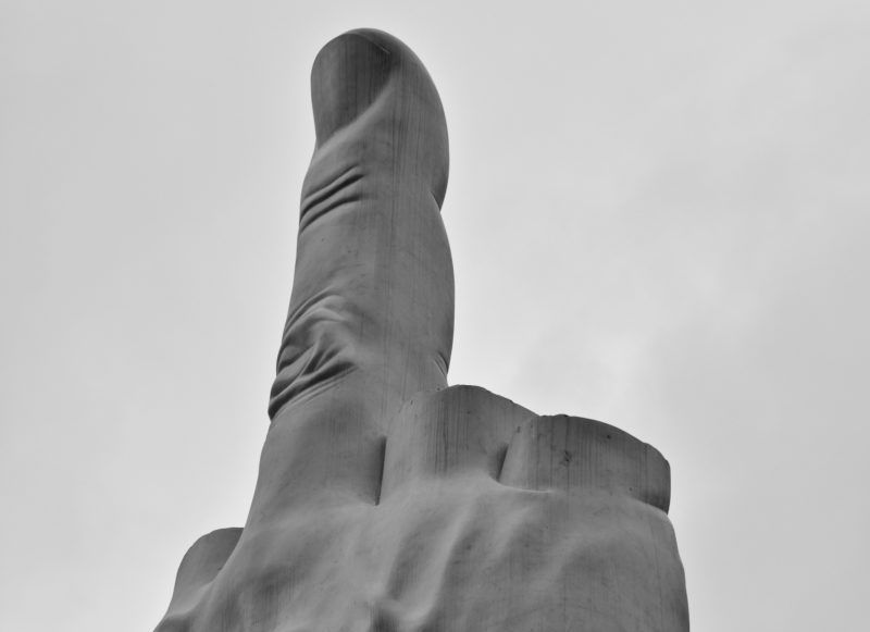 Maurizio Cattelan - L.O.V.E., 2010, White Carrara Marble, roman travertine, 1100 x 470 x 470 cm (36.1 x 15.5 x 15.5 feet), Piazza Affari Milano, Italy