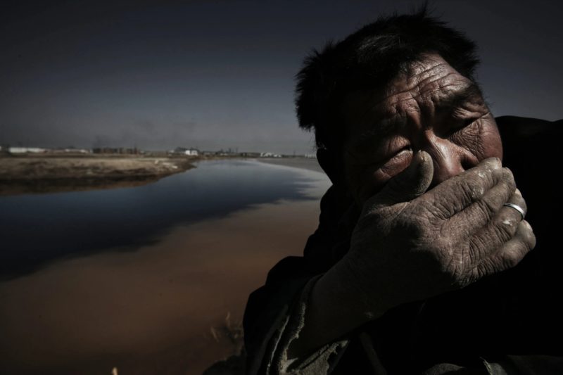 Lu Guang - A sheepherder on the bank of the Yellow River. Shizuishan City, Ningxia, April 23, 2006