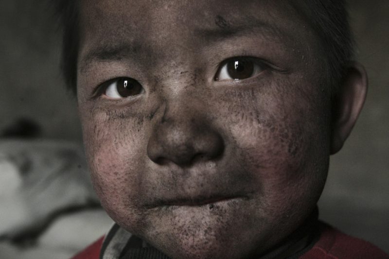 Lu Guang - Children also live in the industrial district. China is now the world’s second-largest economy. Its economic development has consumed lots of energy and generated plenty of pollution