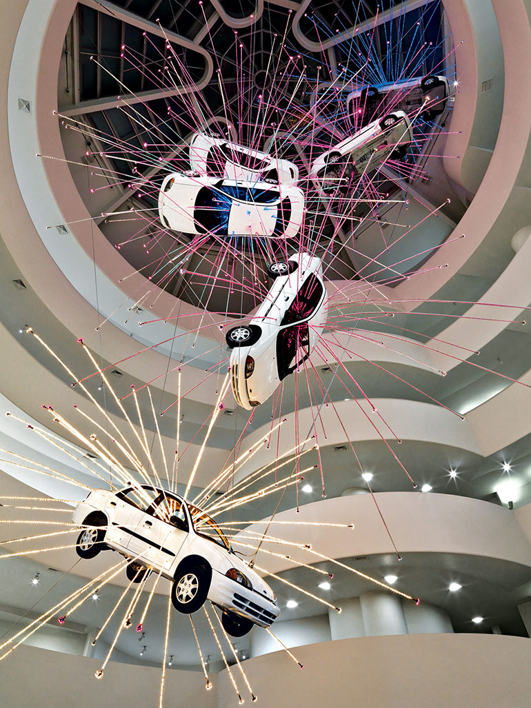 Cai Gao-Qiang – Inopportune – Stage One, 2004, nine Ford Taurus cars, sequenced multichannel light tubes, Guggenheim, New York