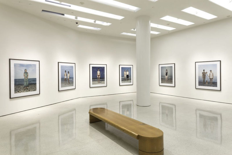Installation view of the Beach Portraits (1992-2002), from the exhibition Rineke Dijkstra – A Retrospective, Solomon R. Guggenheim Museum, New York, June 29 – October 8, 2012