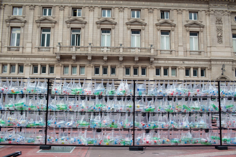 Luzinterruptus - Labyrinth of plastic waste, 2018, 15000 discarded water bottles, bags, metal, lights, 12 x 12 m, Plaza Vaticano, Buenos Aires, Argentina