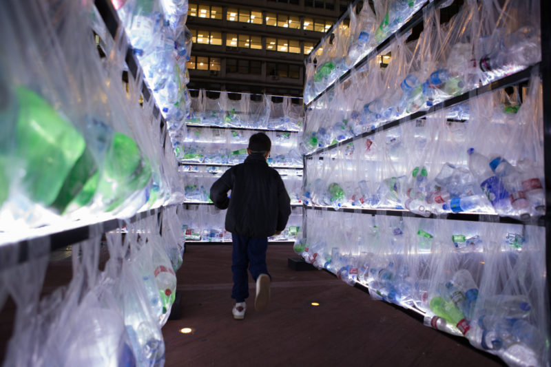 Luzinterruptus - Labyrinth of plastic waste, 2018, 15000 discarded water bottles, bags, metal, lights, 12 x 12 m, Plaza Vaticano, Buenos Aires, Argentina