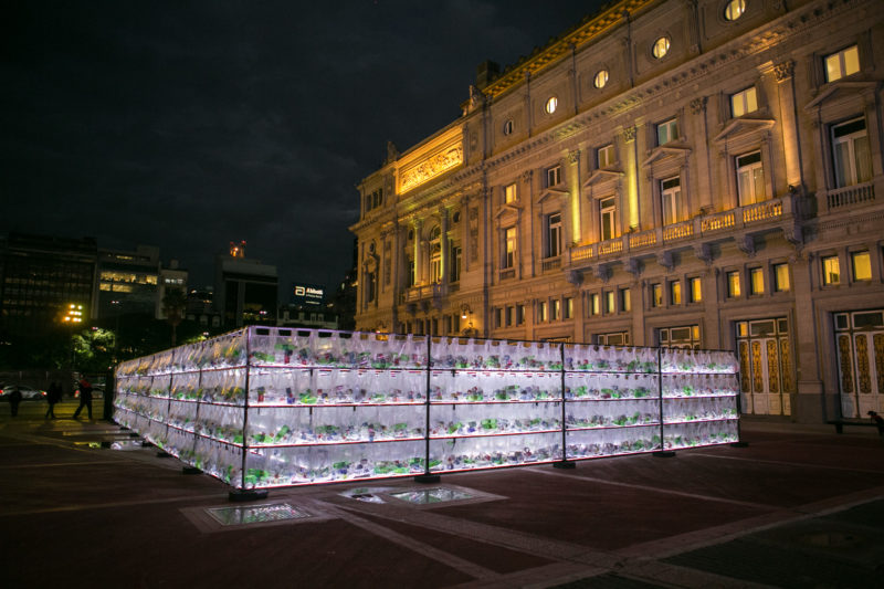 Luzinterruptus - Labyrinth of plastic waste, 2018, 15000 discarded water bottles, bags, metal, lights, 12 x 12 m, Plaza Vaticano, Buenos Aires, Argentina