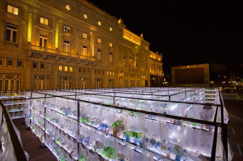 Luzinterruptus - Labyrinth of plastic waste, 2018, 15000 discarded water bottles, bags, metal, lights, 12 x 12 m, Plaza Vaticano, Buenos Aires, Argentina