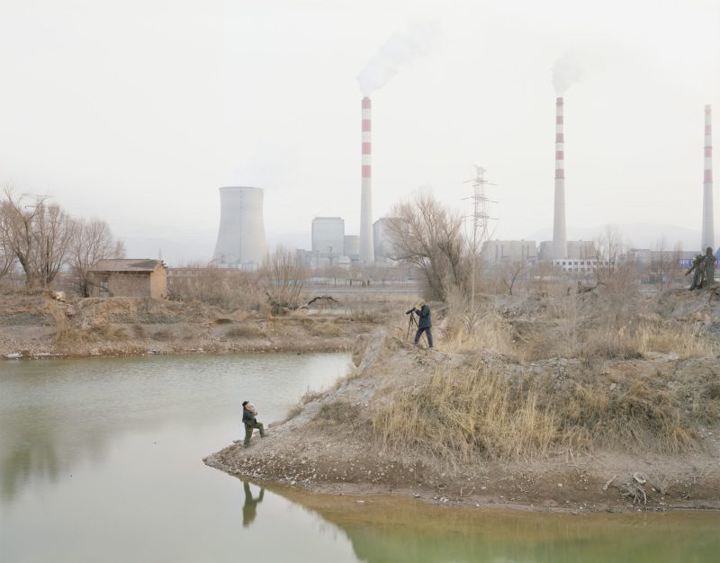 Zhang Kechun – A man photographing by the river, Gansu province
