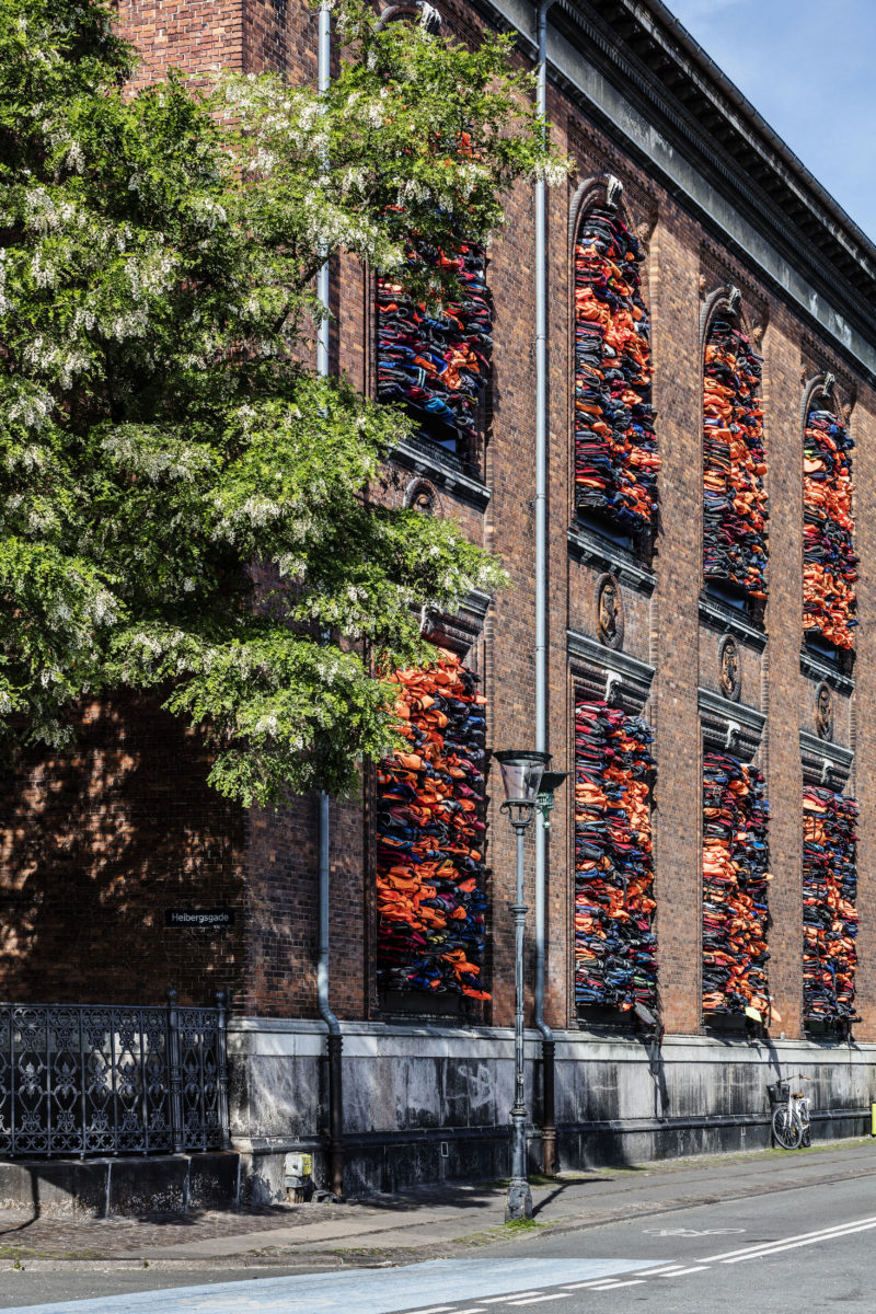 Ai Weiwei - Soleil Levant, 2017, life jackets in front of windows of facade, Kunsthal Charlottenborg, 2017, Anders Sune Berg.