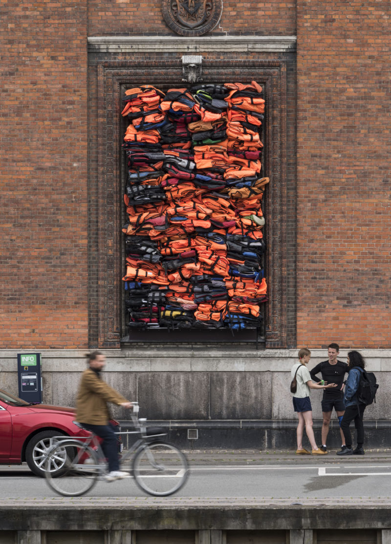 Ai Weiwei - Soleil Levant, 2017, life jackets in front of windows of facade, Kunsthal Charlottenborg, 2017, David Stjernholm.