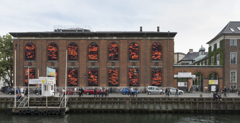 Ai Weiwei - Soleil Levant, 2017, life jackets in front of windows of facade, Kunsthal Charlottenborg, 2017, David Stjernholm.