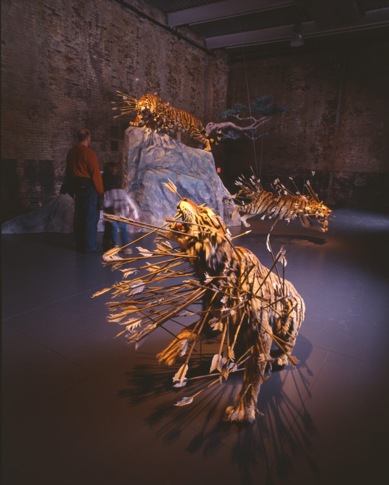 Cai Guo-Qiang – Inopportune Stage One, 2004, nine life-sized tiger replicas, arrows