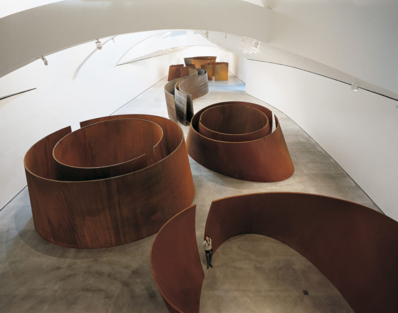 Richard Serra - Torqued Ellipses I, II, IV, V, VI (1996-99), Double Torqued Ellipses I, II, III (1997-99) and Snake (1996) Nine sculptures, weathering steel Variable dimensions, Installation view