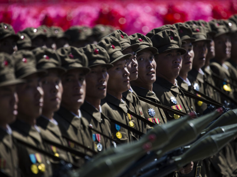 David Guttenfelder - North Korean military goose-step past the grandstand on Kim Il Sung Square in Pyongyang during a mass military parade to mark its 70th anniversary as a nation