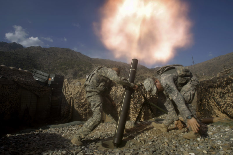 David Guttenfelder – Afghanistan - U.S. soldiers fire mortars at enemy firing positions from a base in the Pech River Valley in Afghanistan's Kunar province in 2009.