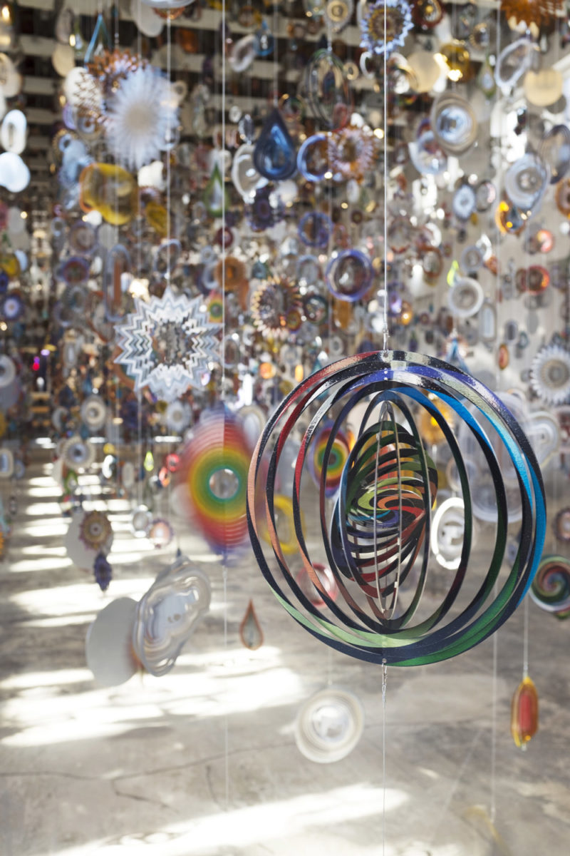 Detail of Nick Cave - Kinetic Spinner Forest, 16,000 hanging mobiles made from metallic spinning garden ornaments