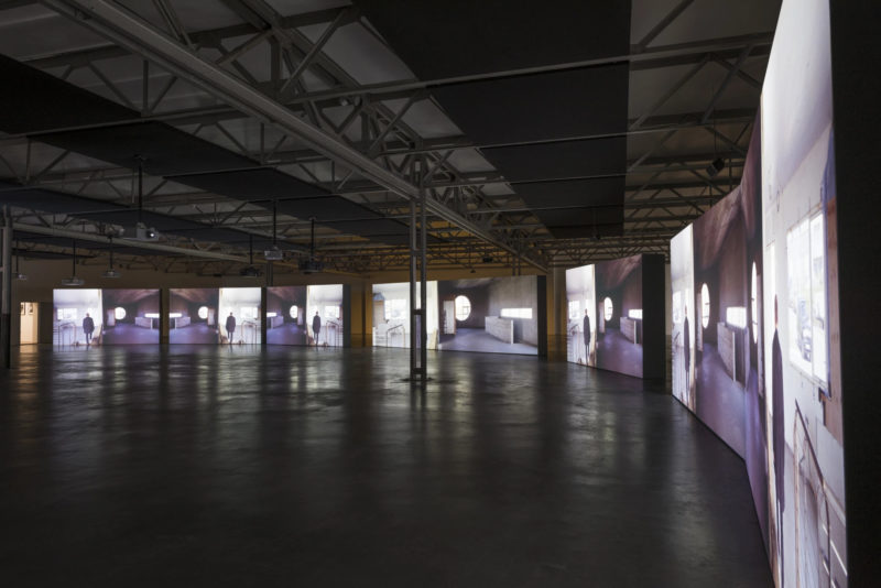 Ingvar Eggert Sigurosson in Isaac Julien's Playtime, 2014, Seven screen ultra high definition video installation with 7.1 surround sound, 66 min 57 sec, De Pont Museum, Tilburg, 2015