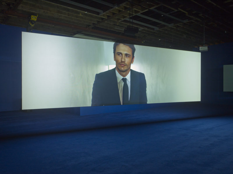 James Franco in Isaac Julien's - Playtime, 2014, Seven screen ultra high definition video installation with 7.1 surround sound, 66 min 57 sec, Victoria Miro, London, 2014
