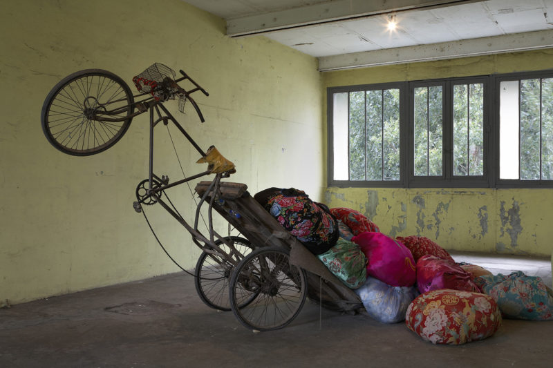 Kimsooja - Bottari Tricycle, 2009, used Chinese tricycle, bedcovers and clothes, 295 x 190 cm, Installation view Continua Gallery, Le Moulin 2009